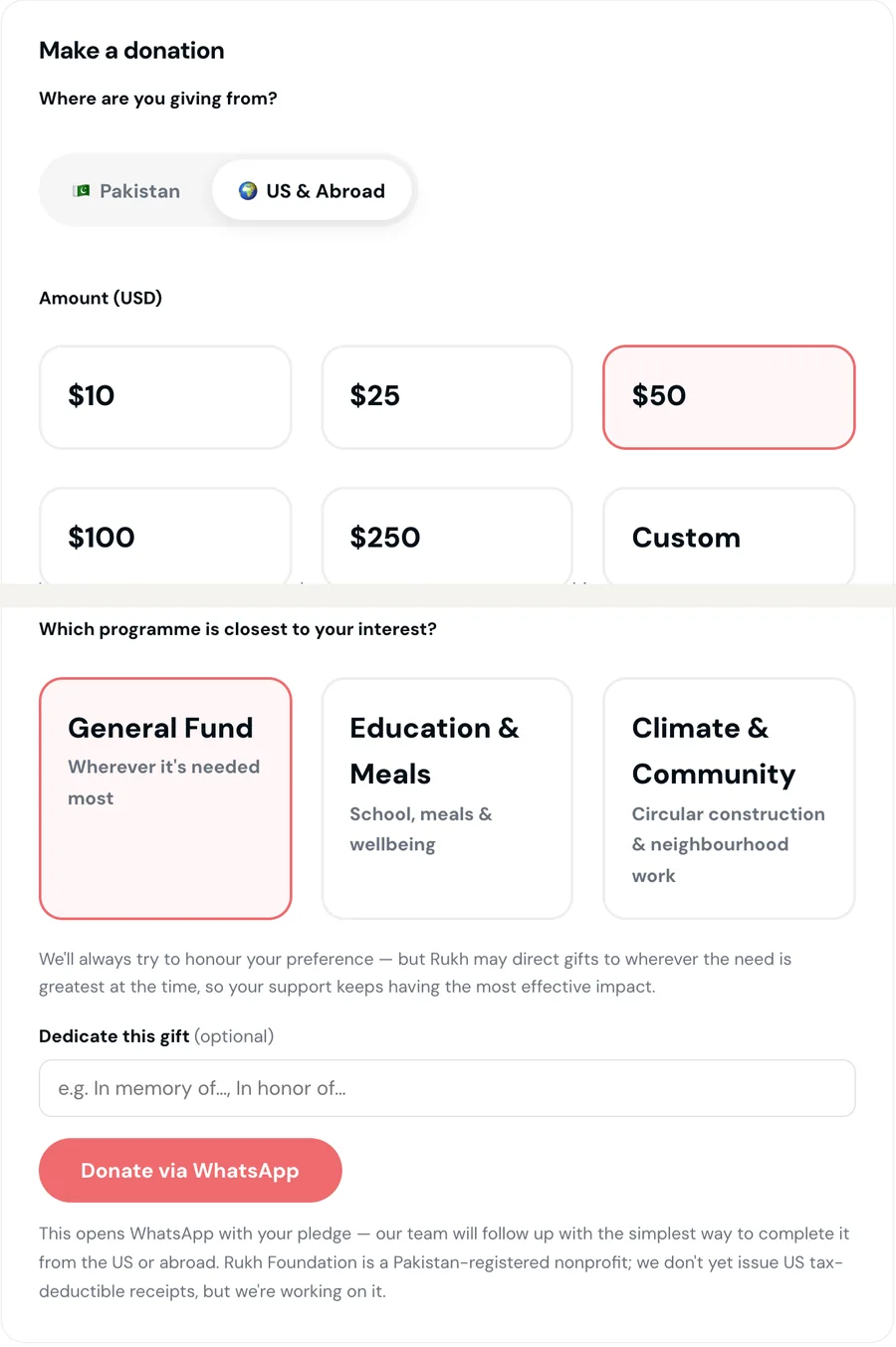 The donate form with the US and Abroad tab selected: dollar amounts, a programme preference and a Donate via WhatsApp button